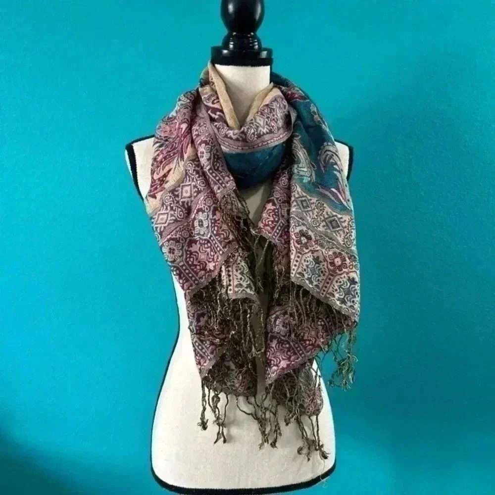 Blue patterned scarf with gold accent threads